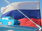В Краснодаре развернули самый большой в мире флаг России из автомобилей