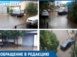  После ремонта дороги стало затапливать двор и тротуар в Краснодаре 
