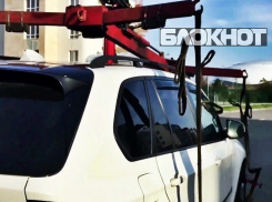 Житель Сочи не позволил эвакуатору забрать свою машину 